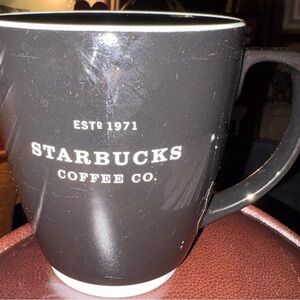 Starbucks Barista 2002 black ceramic mug with the "ESTD 1971 STARBUCKS COFFEE CO